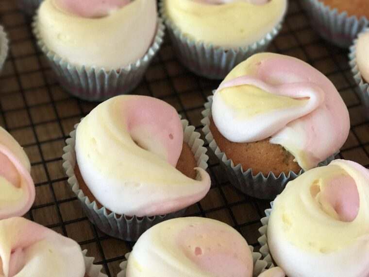 Swirly rainbow iced cupcakes
